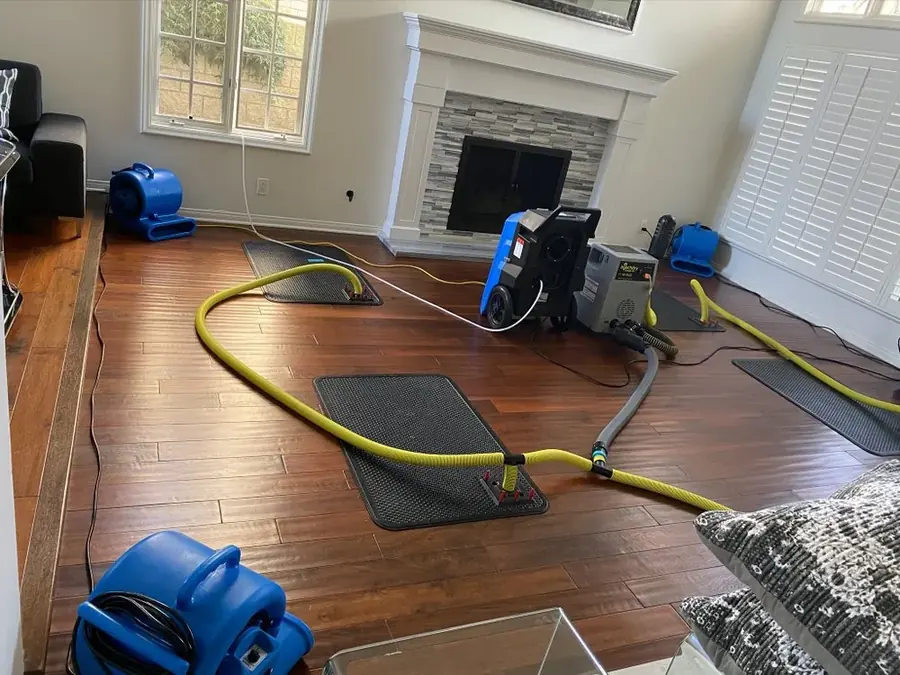 Air movers and dehumidifiers drying a Williamstown, NJ room